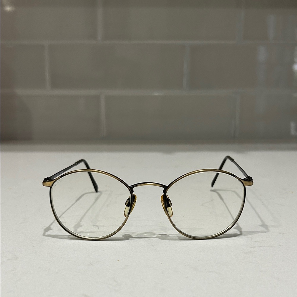 Giorgio Armani men’s Round Metal Eyeglasses in Gold and Black
